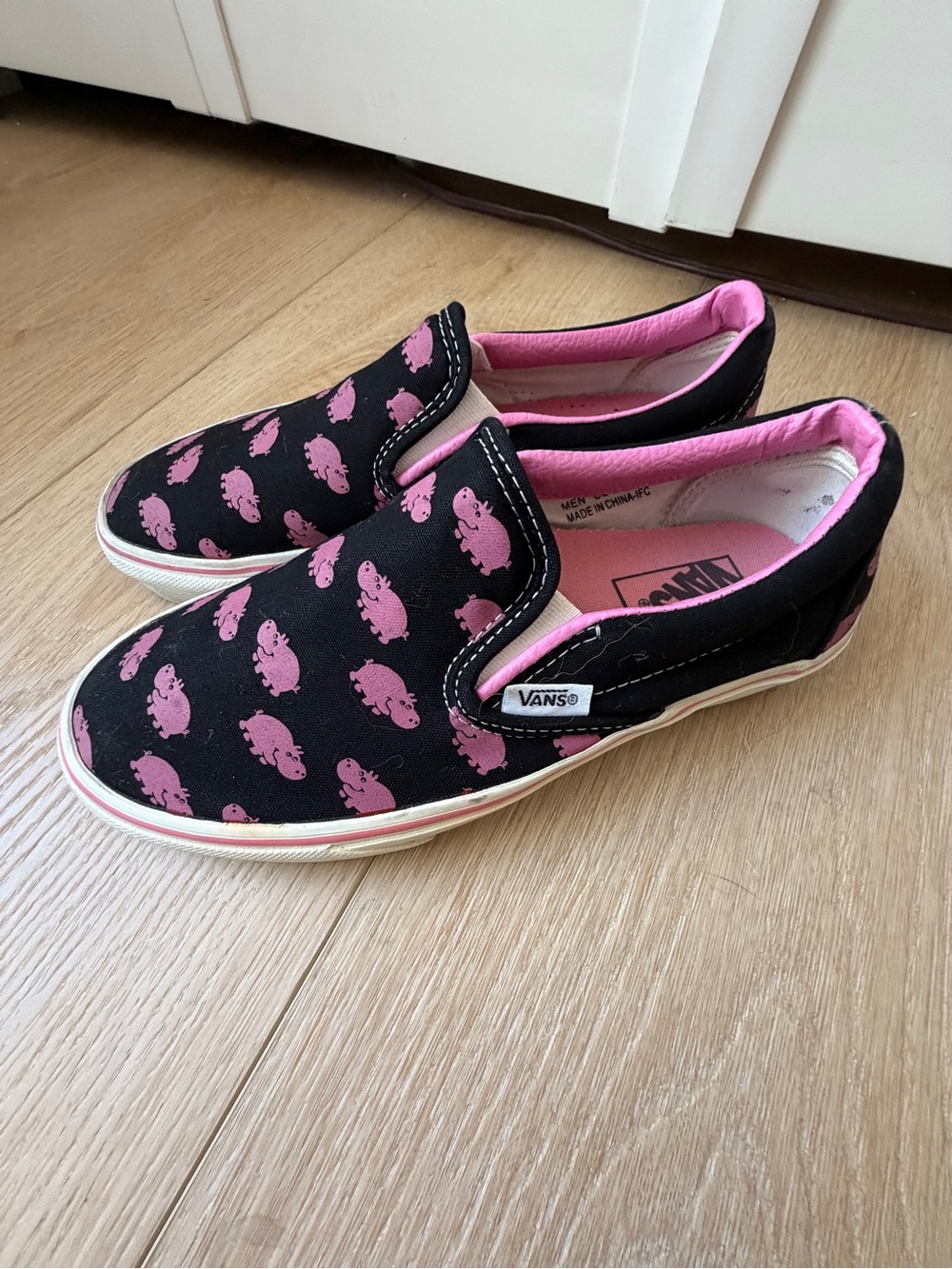 Vans Black Slip-On Sneakers with Pink Hippo Print
